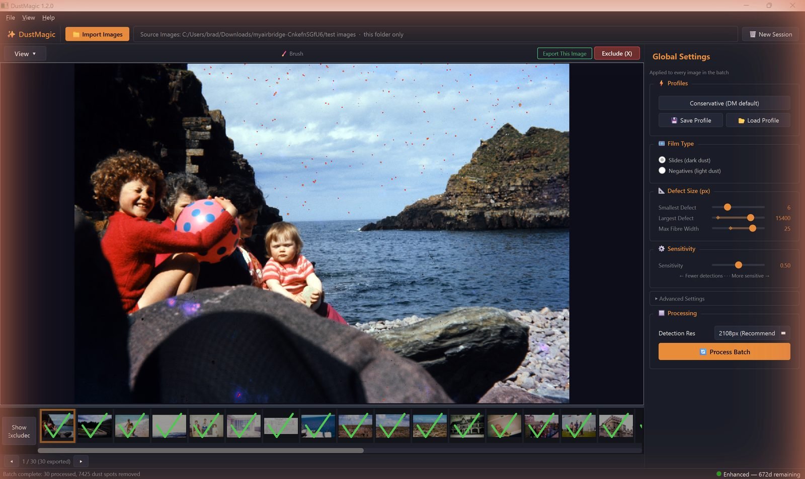 Batch complete with green ticks on every filmstrip thumbnail